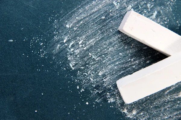 White chalks on school desk — Stock Photo, Image