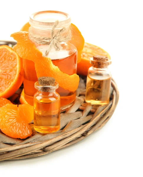 Tangerine essential oil and tangerines, isolated on white — Stock Photo, Image