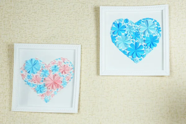 Beautiful handmade picture with heart from paper flowers on wall — Stock Photo, Image