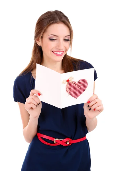 Mulher atraente com cartão postal, isolado em branco — Fotografia de Stock