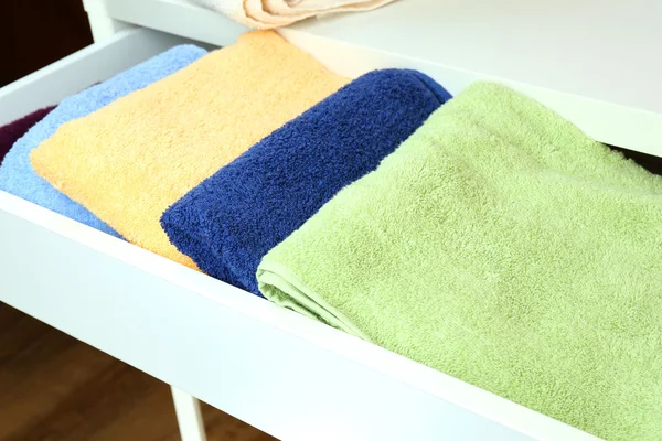 Towels in open drawer close up — Stock Photo, Image
