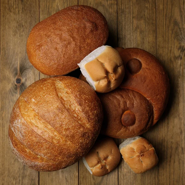 Bakery products on wooden background — Stock Photo, Image