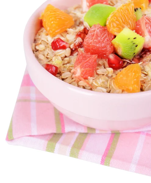 Delicious oatmeal with fruit in bowl on table close-up — Stock Photo, Image