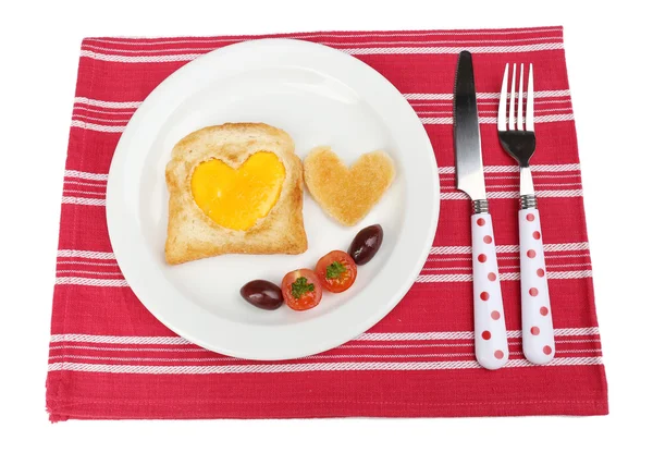 Scrambled eggs with bread on plate, on color napkin — Stock Photo, Image