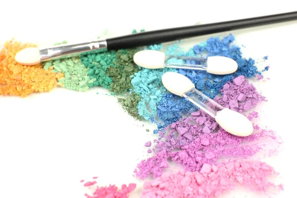 Rainbow crushed eyeshadow and professional make-up brush close up — Stock Photo, Image