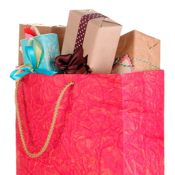 Presents in paper bag isolated on white — Stok Foto