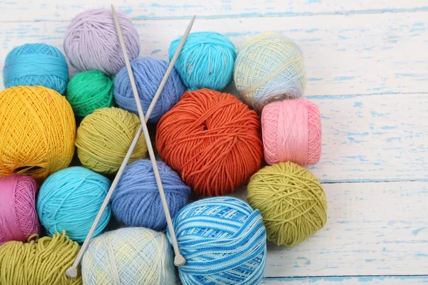 Yarns for knitting on wooden table close-up — Stock Photo, Image