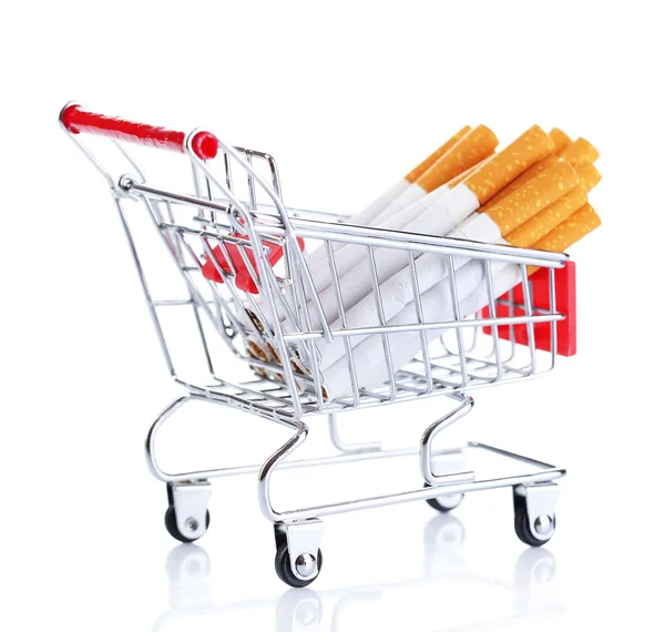 Cigarettes in shopping cart isolated on white — Stock Photo, Image