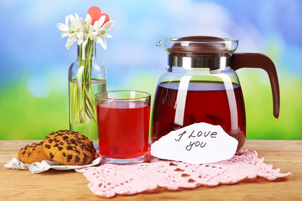 Tasty herbal tea and cookies on wooden table — Stock Photo, Image