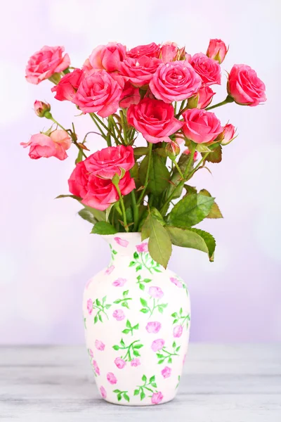 Beautiful small pink roses, on light background — Stock Photo, Image