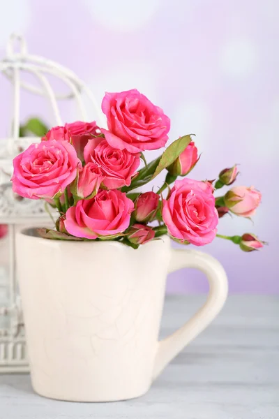 Beautiful small pink roses, on light background — Stock Photo, Image