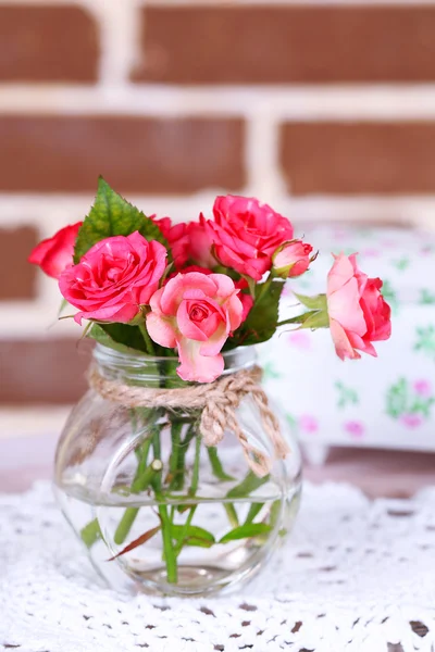 Beautiful still life with small pink roses — Stock Photo, Image