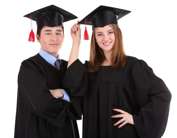 Twee gelukkige afstuderen studenten geïsoleerd op wit — Stockfoto