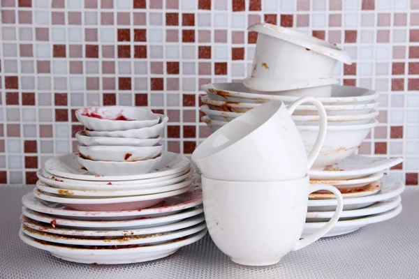 Dirty dishes on bright background — Stock Photo, Image