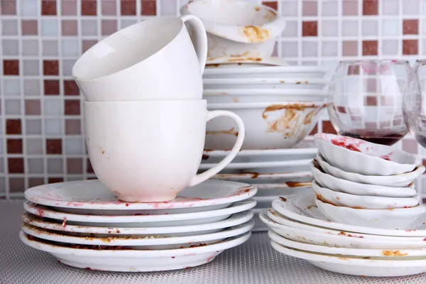 Dirty dishes on bright background — Stock Photo, Image