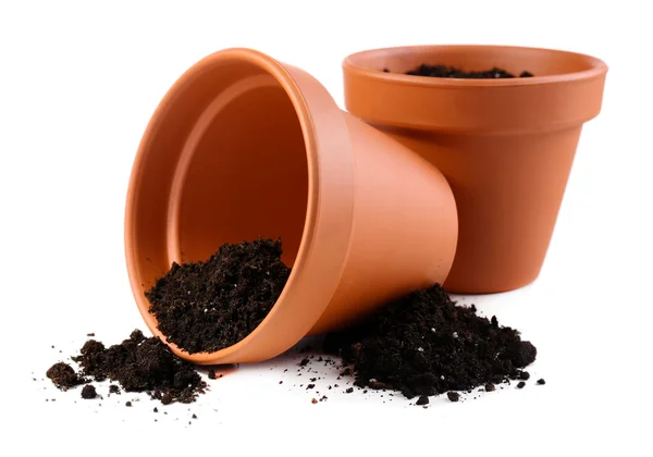 Clay flower pots with soil, isolated on white — Stock Photo, Image