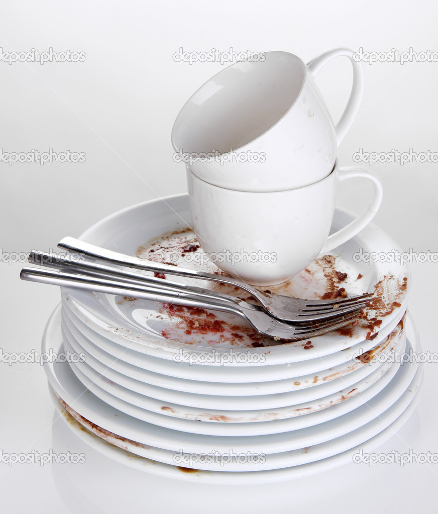 Dirty dishes isolated on white