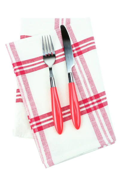 Kitchen cutlery on color napkin isolated on white — Stock Photo, Image