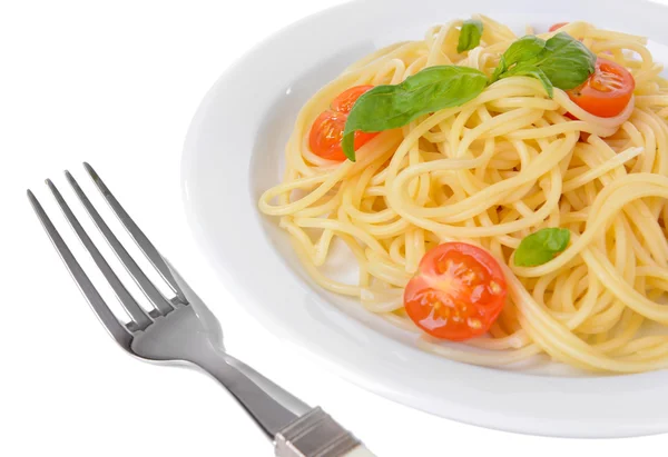 Espaguete delicioso com tomates em close-up prato — Fotografia de Stock