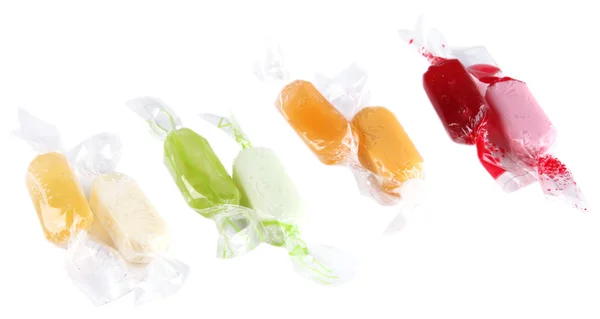 Вкусные конфеты, изолированные на белом — стоковое фото