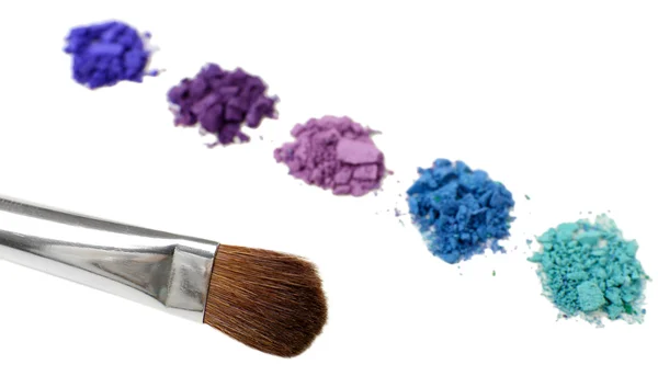 Colorful crushed eyeshadow and professional make-up brush isolated on white — Stock Photo, Image