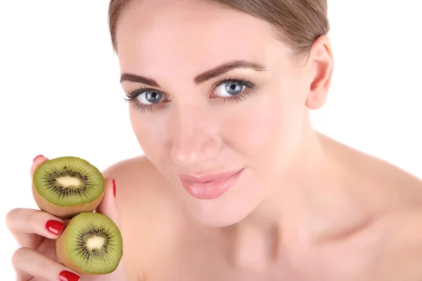 Smuk ung kvinde holder kiwi frugt, isoleret på hvid - Stock-foto