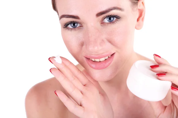 Beautiful girl moisturizing face cream, close-up, isolated on white — Stock Photo, Image