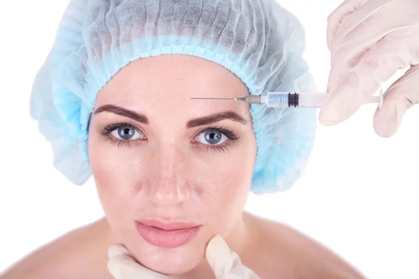 Frau in Schönheitsklinik bekommt Botox-Injektion, isoliert auf weiß — Stockfoto