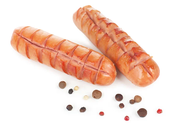 Grilled sausages isolated on white — Stock Photo, Image