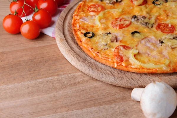 Tasty pizza on table close-up