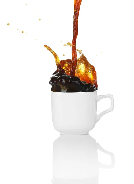 Pour coffee into cup with splash, isolated on white — Stock Photo, Image