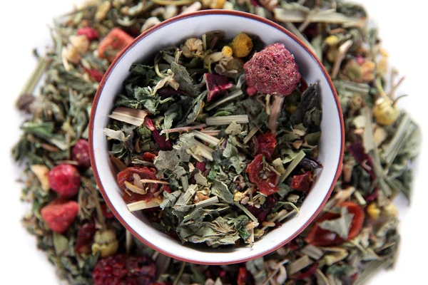 Dry green tea in bowl close up — Stock Photo, Image