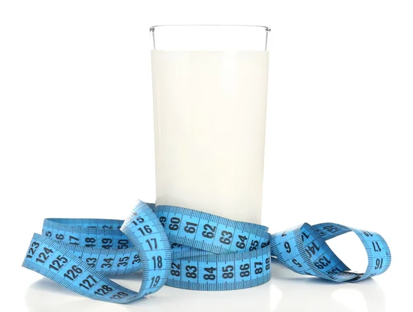 Glass of milk with measuring tape isolated on white — Stock Photo, Image