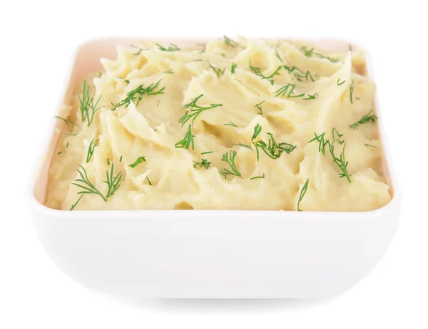 Delicious mashed potatoes with greens in bowl isolated on white — Stock Photo, Image