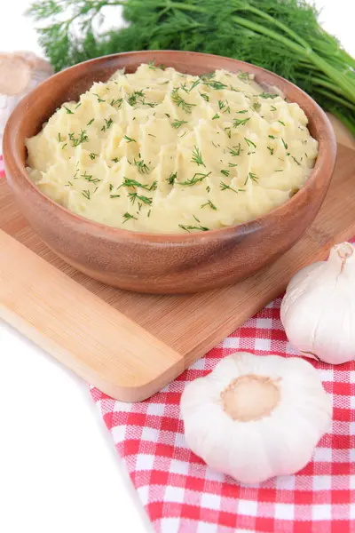 Delicious mashed potatoes with greens in bowl on table close-up — Stock Photo, Image