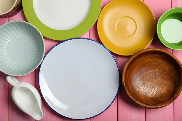 Different tableware on wooden background — Stock Photo, Image