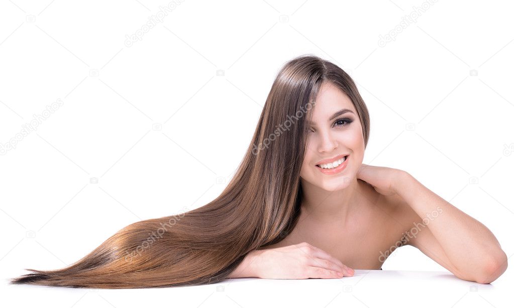 Beautiful young woman with long hair isolated on white