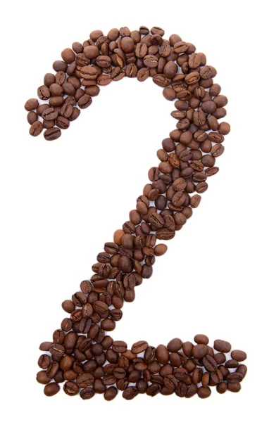 Kahve çekirdekleri üzerine beyaz izole numarası — Stok fotoğraf