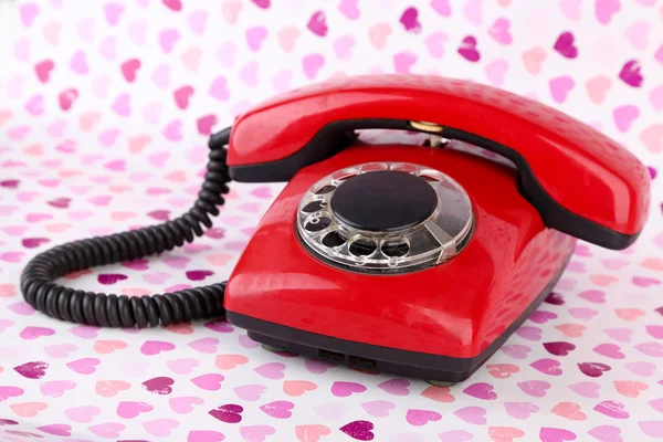 Red retro telephone on bright background — Stock Photo, Image