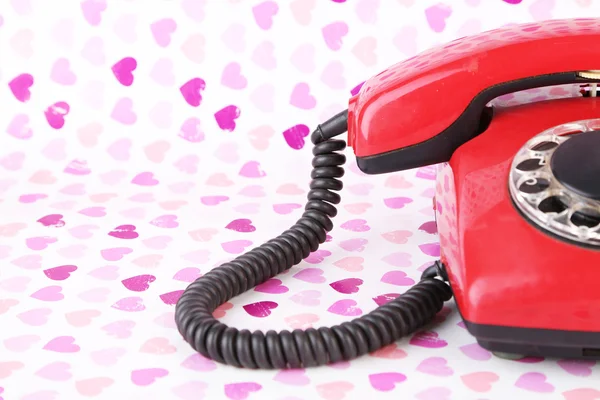 在明亮的背景上的红色复古电话 — 图库照片