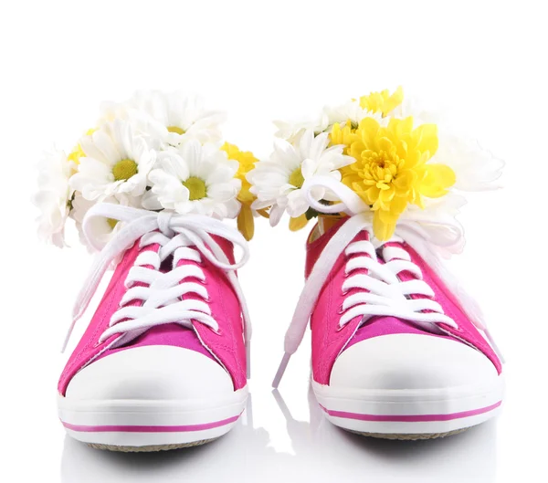 Hermosos zapatos de goma con flores en el interior, aislados en blanco —  Fotos de Stock