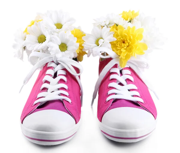 Hermosos zapatos de goma con flores en el interior, aislados en blanco —  Fotos de Stock