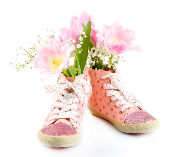 Hermosos zapatos de goma con flores en el interior, aislados en blanco —  Fotos de Stock