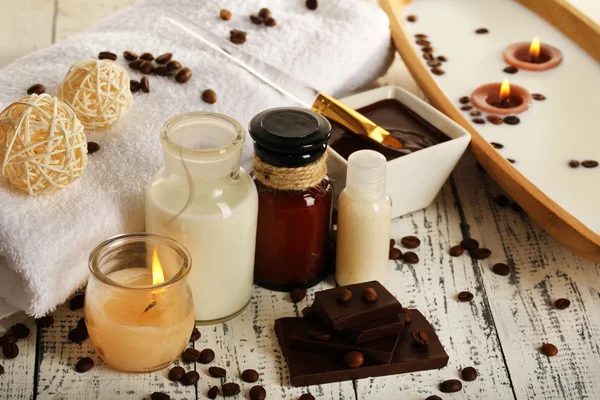 Beautiful chocolate spa setting on wooden table close-up — Stock Photo, Image