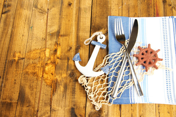 Table place setting with decorations on color wooden background