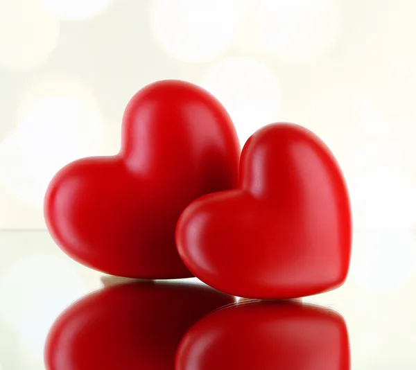 Red hearts on light background Stock Image