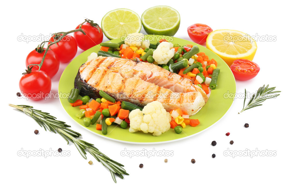Tasty grilled salmon with vegetables, isolated on white