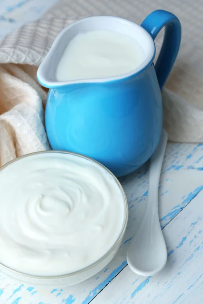 Dairy products on wooden table background — Stock Photo, Image