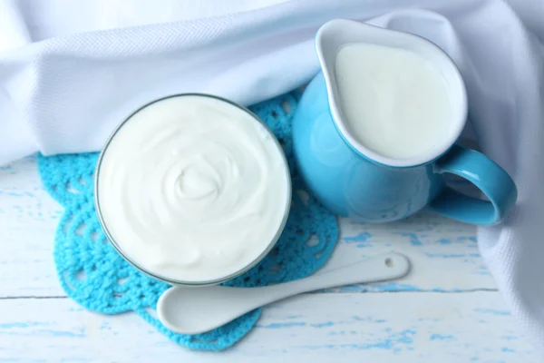 Dairy products on wooden table background — Stock Photo, Image