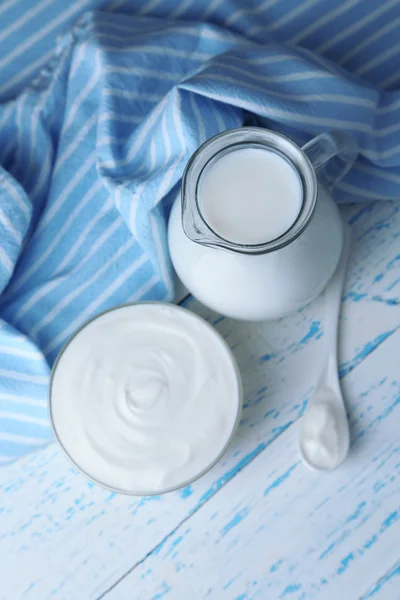 Dairy products on wooden table background — Stock Photo, Image